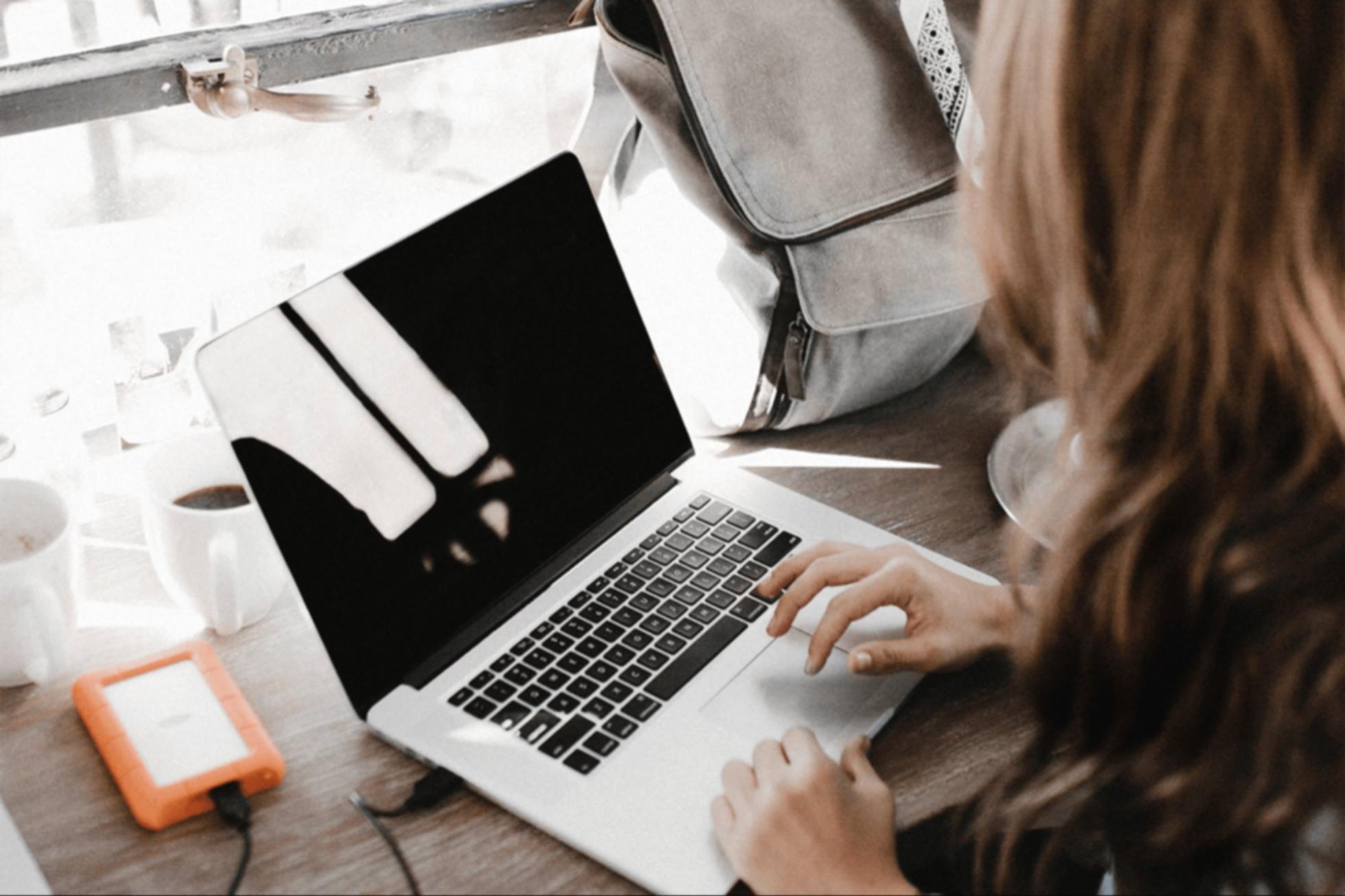 Fashion trend analysis workspace with seasonal collection materials